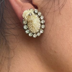 Vintage Miriam Haskell clip earrings. Rhinestone with cream roses.